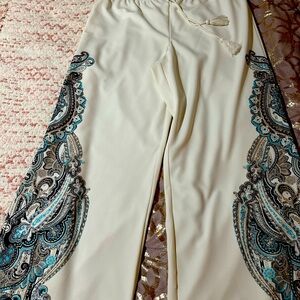 Off white paisley border pants.